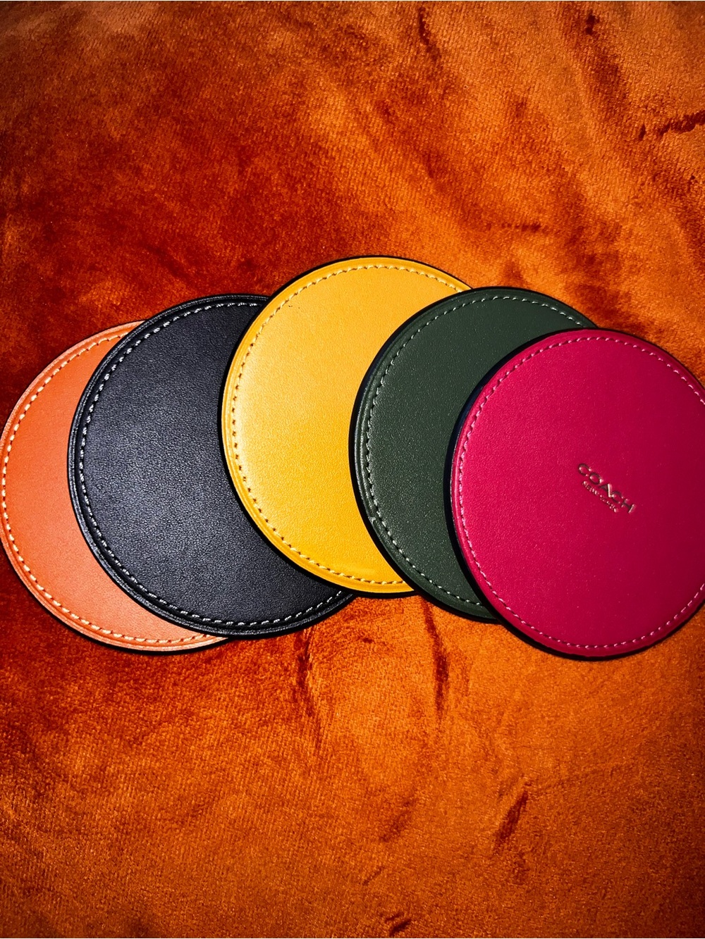 Set of 5 COACH Coasters in Black, Yellow, Orange, Red & Green